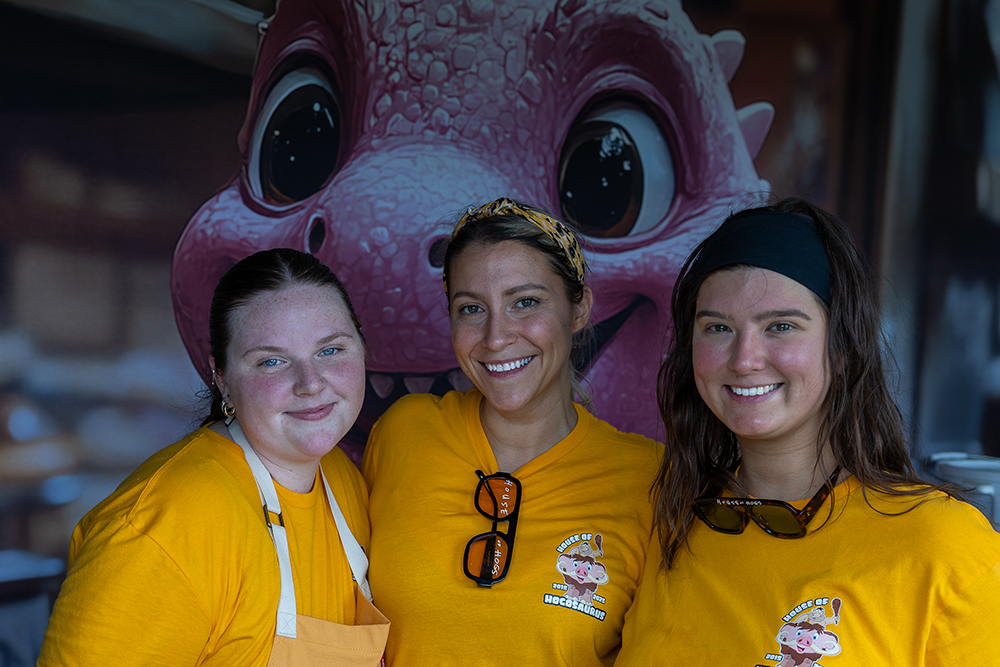 Smiling supporters at a House of Hogs event