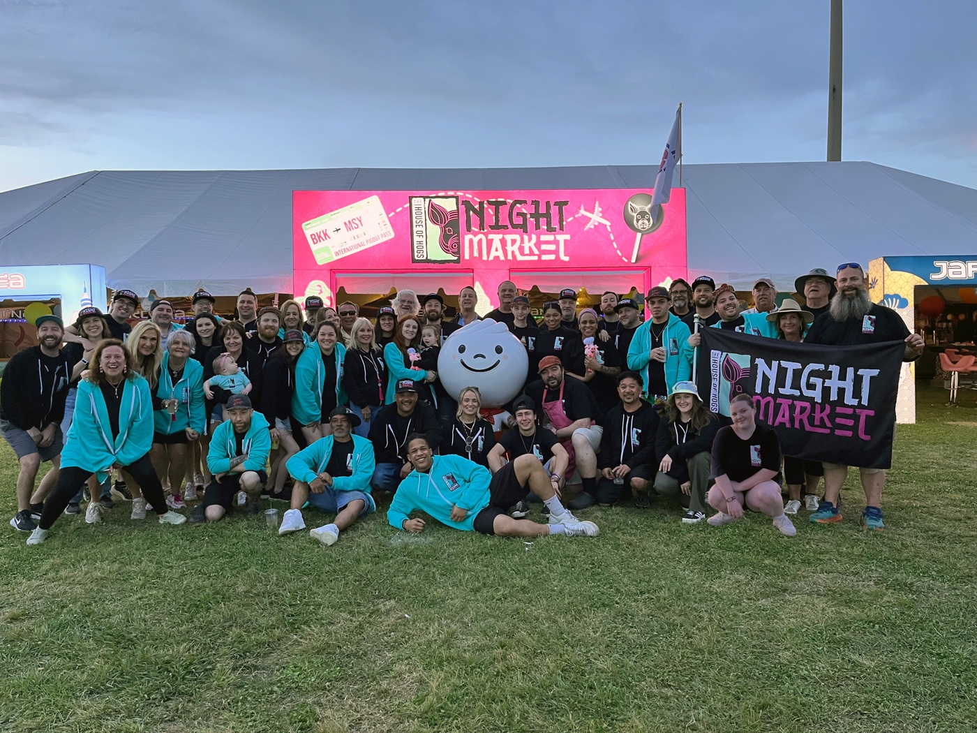 The House of Hogs team and their festival booth