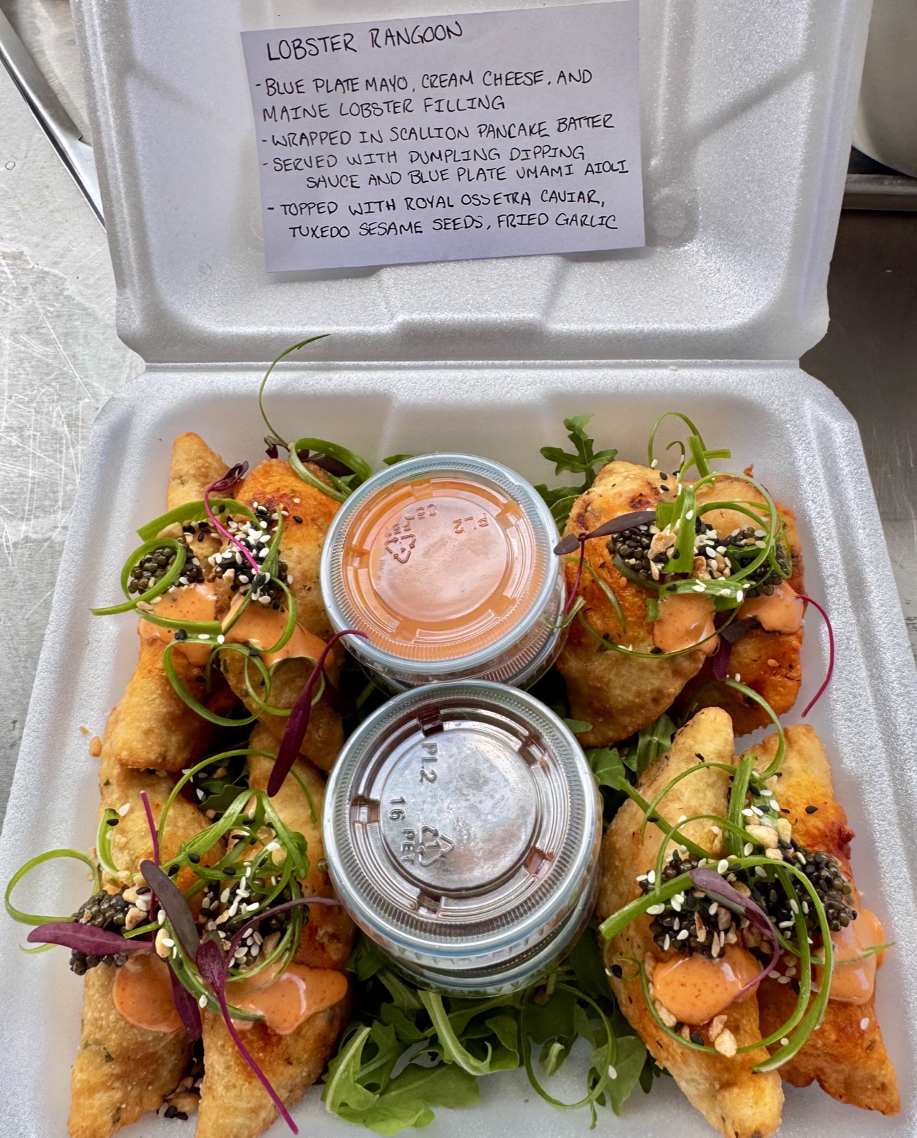 Lobster rangoon topped with caviar