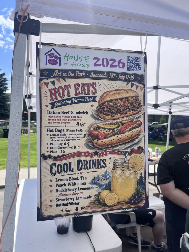 The House of Hogs 2026 menu poster hanging at the booth